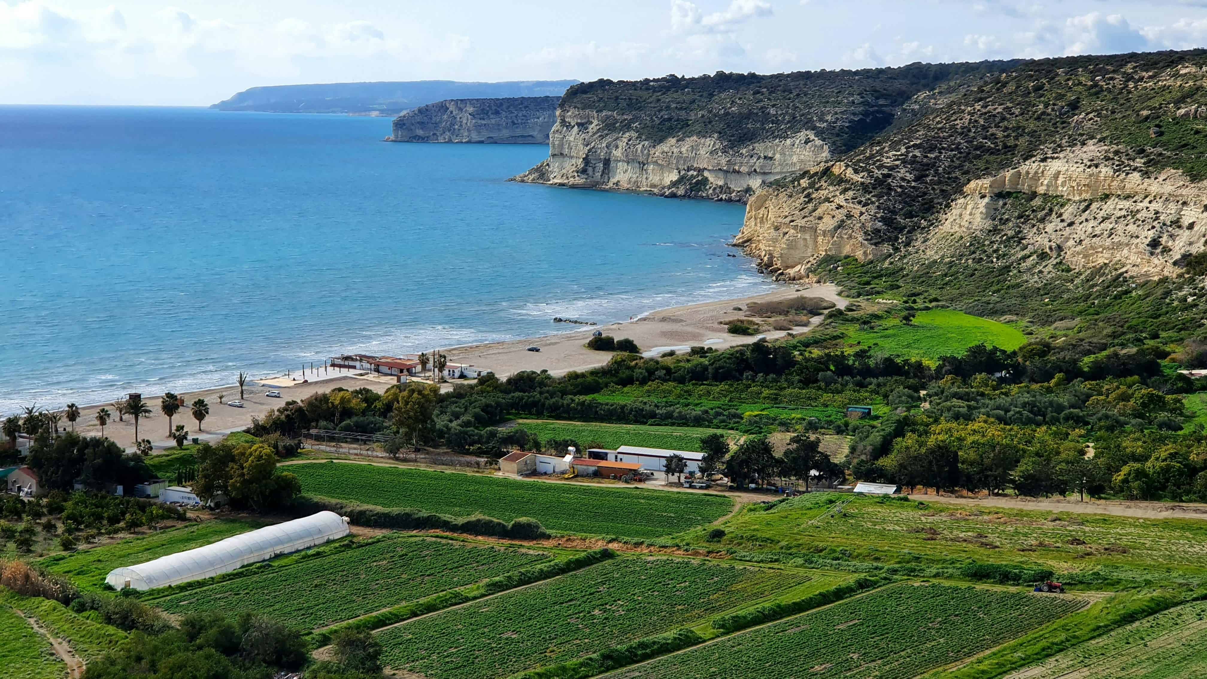 Picturesque view of the coast with cliffs and land