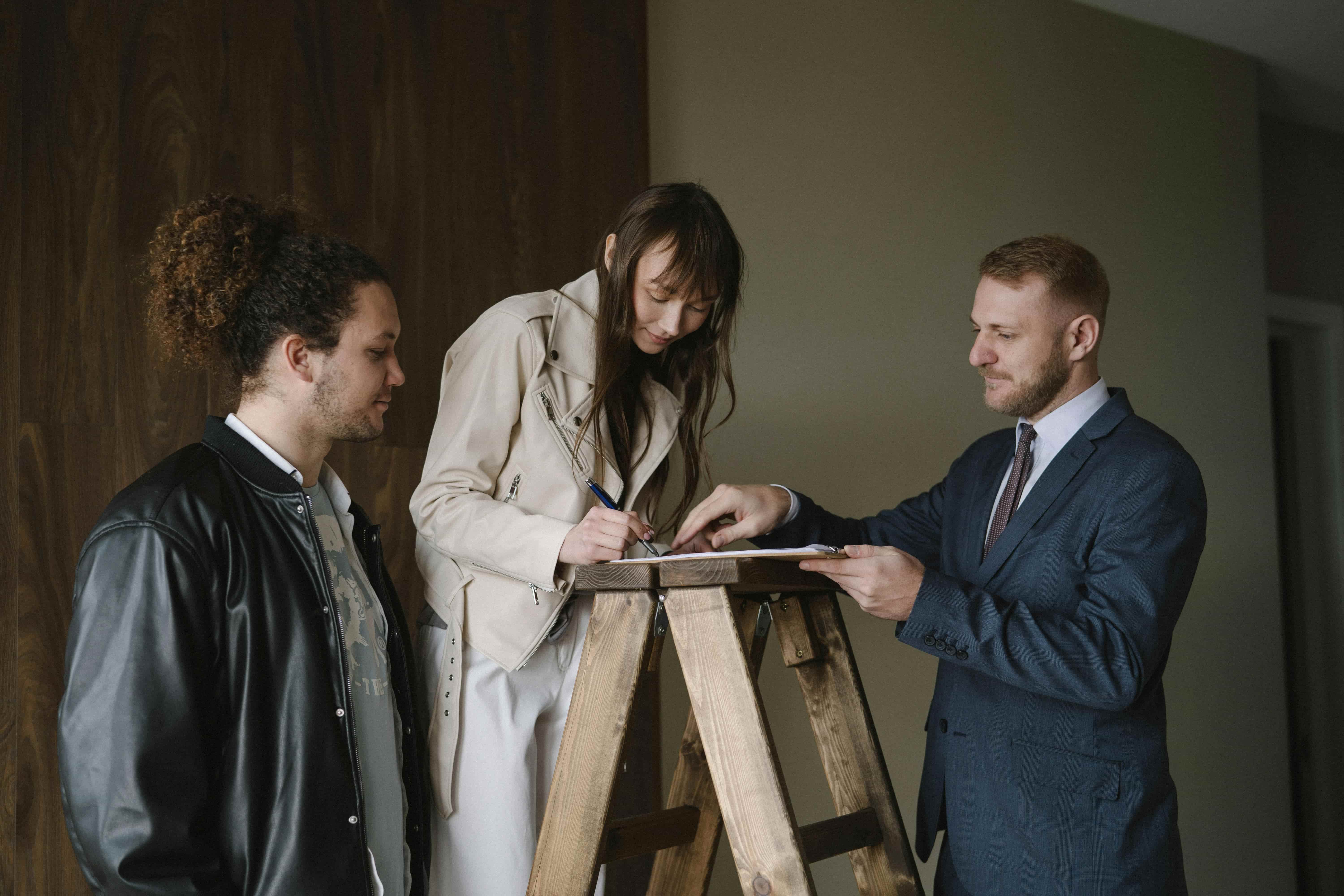 Woman Signing a Contract